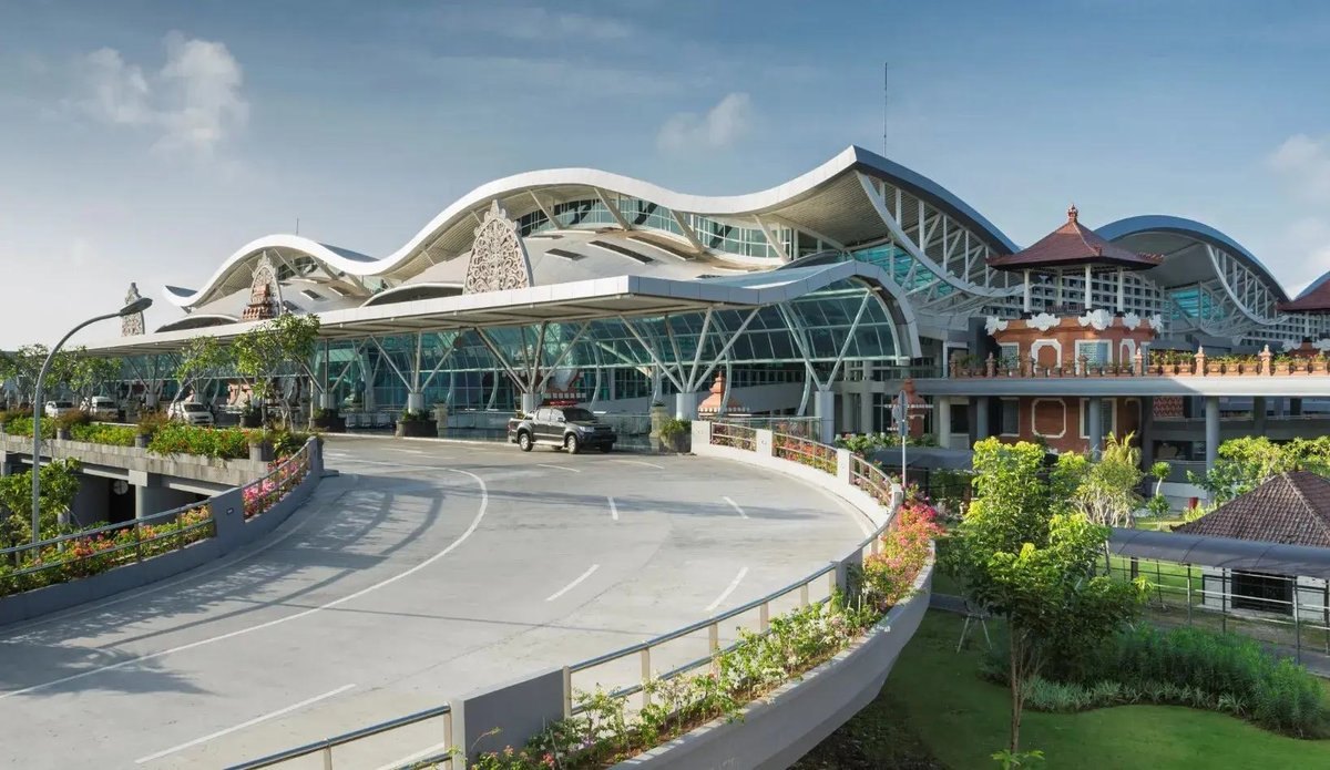 The curved roofline and forecourt of Ngurah Rai International Airport